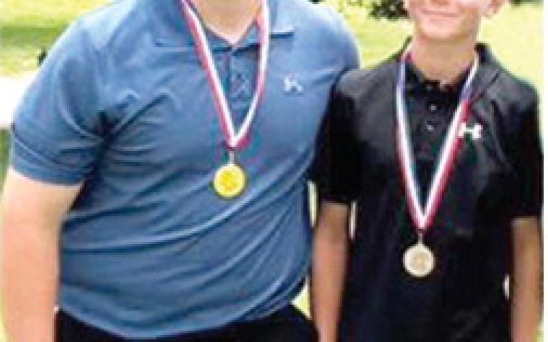 Cajen Smith and Jase Mooney placed first and second in the 13-14 division of the Columbus Junior Golf Tournament, June 4, following a week of Junior Golf Camp. Courtesy photo.