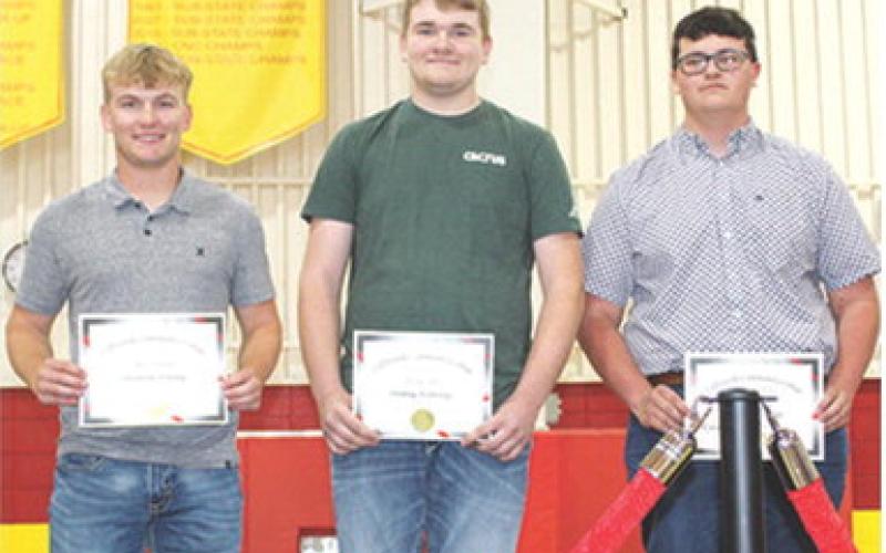 Seniors, Syler Schuberger, Brodey Allison, and Brody Westervelt earned multiple technical certificates through their studies at Coffeyville Community College Technical School while completing their high school coursework. Their certificates were awarded during the Senior Assembly, May 16, at the CUHS Gymnasium. Not pictured, Johnny Perry.