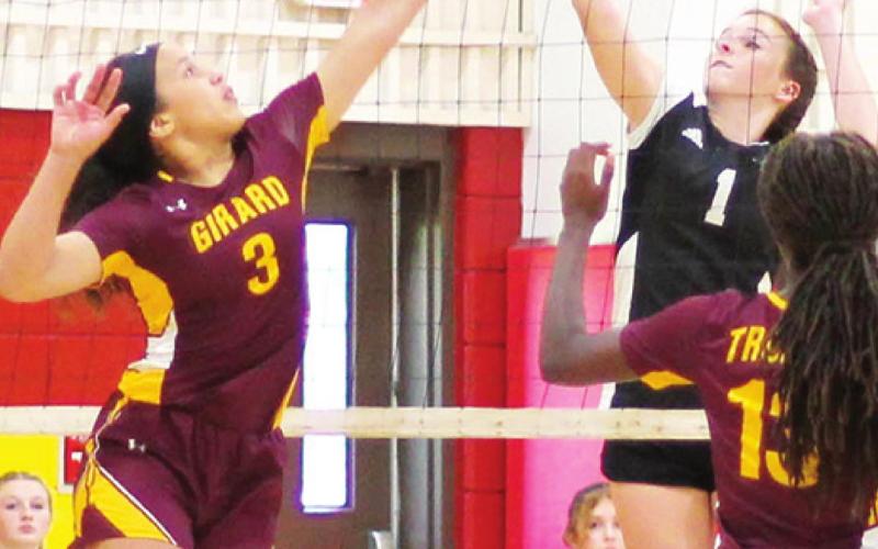 Nicole Lang, Girard and Sophia Merando, Frontenac, battle at the net during an eighth grade tournament hosted by the Lady Titans in September at the high school gym. Girard’s, Mia Jubber, is also at the net while Kylie Perry and Andrea Wood look on from the Frontenac bench. The Lady Raiders are the number three seed and Girard, number four, in Thursday’s CCCJL League Tournament.