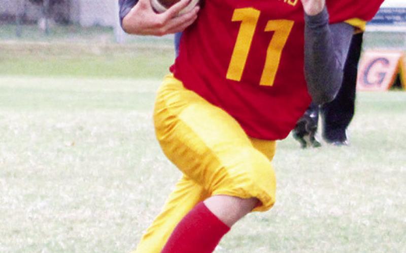 Titan Eighth Grader Levi Simpson, gains ground in the junior high eighth grade game against Parsons, September 22 at Titan Stadium. Columbus lost to Baxter Springs, Thursday, September 29, 0-14. They will host Girard, Thursday, on their home field.