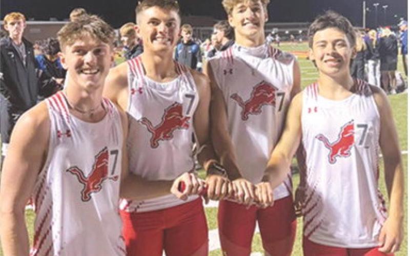 record, Friday night, at the Girard Optimist Club Track and Field Meet, shattering the 16-yearold previous mark by nearly nine seconds with a new time of 3:31.57 minutes. Members of the new record holding team are: Chason Sikes, Cole Parrish, Caleb Grant, and Randy Byler. Courtesy photo. The Baxter Springs High School Boys 4x400 meter relay team set a new school