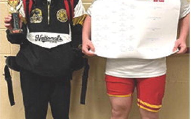 Cam Carter placed second and Cajen Smith won the championship of their respective weight classes at the Tournament of Champions Saturday in Salina. Courtesy photo.