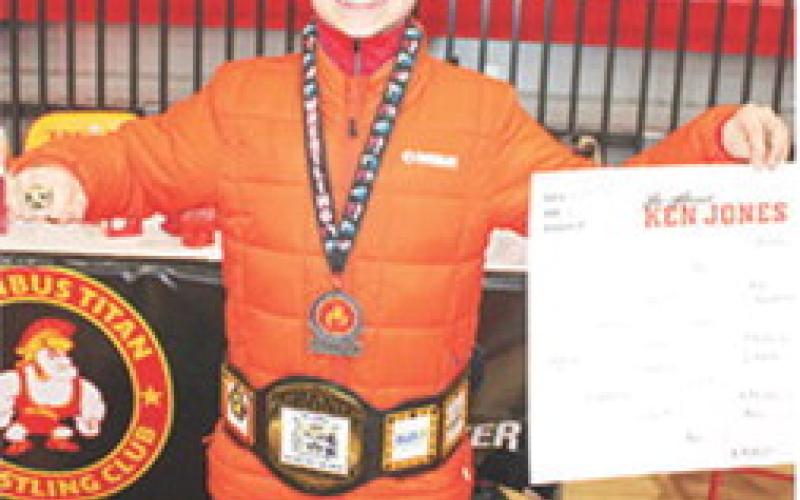 Lucas Natalini, Columbus Wrestling Club, took first place in the 10U, 85-pound weight class at the Sixth Annual Ken Jones Classic Wrestling Tournament December 22 at the Columbus High School Gymnasium. Lucas also wrestled in the 12 and under age division, 84-88-pound weight class and took second place. He is also sporting the belt he won at a recent Battle for the Belt in Neosho, Mo.