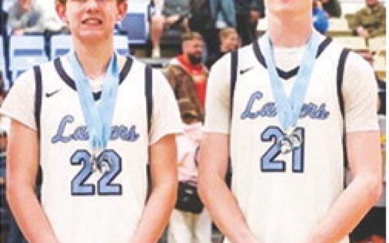Lady Lancer Camryn Sanders, junior, and Lancer Senior, Blake Robinson (unanimous) and junior, Tyler Warner, were chosen for the All-Tournament Teams at the 34th Annual Lancer Classic Basketball Tournament, Friday, following the championship games on their home courts at Southeast High School. The Lancers were the tournament runners-up following a championship loss to Riverton. Courtesy photos.