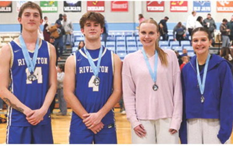 Riverton Ram Senior, Cale Forbes (unanimous), and junior, Tyler Reitz, and Lady Ram Seniors, Avery Barnett and Ellie Helms (unanimous) were selected for the All-Tournament Teams at the 34th Annual Lancer Classic Basketball Tournament, Friday, following the championship games at Southeast High School. Riverton won both the boys and girls championships. Courtesy photo.