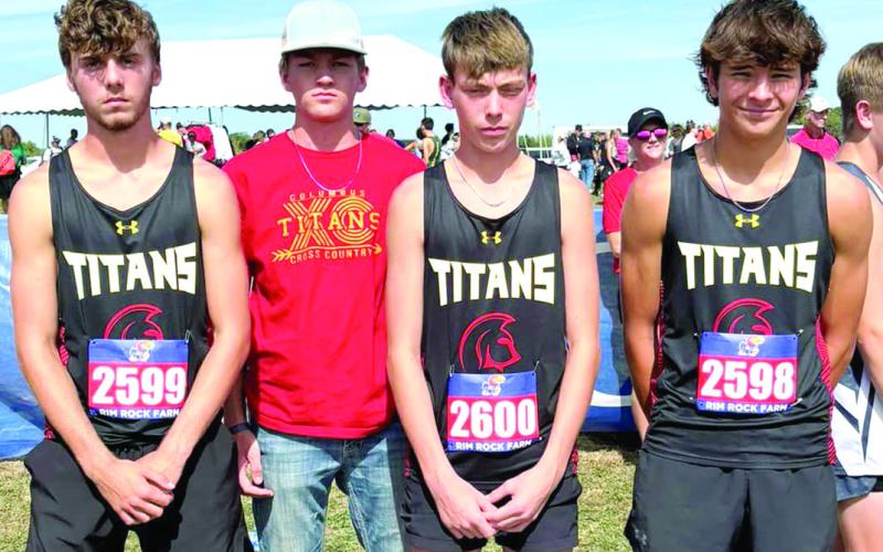 Columbus Titan Cross Country Runners, Levi Simpson, Dane Merrick, Carter Woodcock, and Drake Laurance made the trip to Lawrence, Saturday for the Rim Rock Farm 5K Classic. While Merrick accompanied his teammates, he did not compete in this race. Courtesy photo.