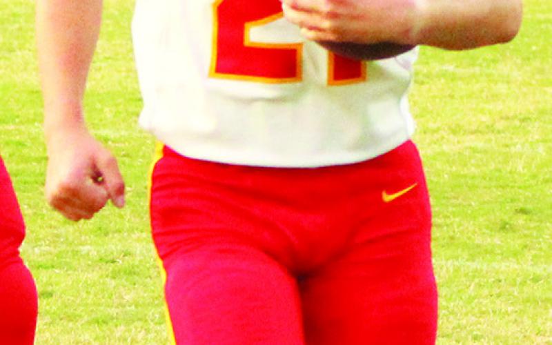 Titan Freshman, Shade Schuberger, crosses the goal line for the two-point conversion minutes after his receiving touchdown from sophomore quarterback, Ethan Midgett. Columbus came up short, 1620, in Baxter Springs, Monday.