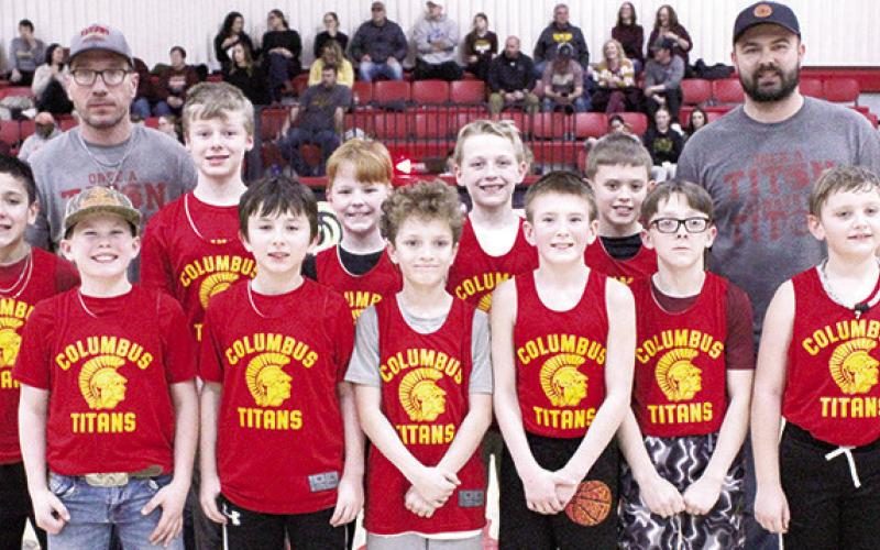 The Columbus Recreation League Fifth Grade Titans were introduced February 11 during the CUHS Titan Basketball home games at the high school gymnasium. Team members are front row: Mason Worden, Hunter Davis, Tucker Siemer, Braston Hays, Dayton Hughes, and Cruz Sharp. Back row: Lucas Haviland, Coach Matthew Haviland, Eamon Wilkins, Beckett Sauerwine, Bode Saiz, Jaxon Harper, and Coach Hazen Hale. Not pictured Kayden Fleshman.