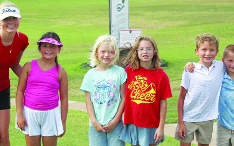 The four-week camp for junior golfers concluded Thursday with five players taking the opportunity to learn from Columbus Unified High School Sophomore, state qualifier, Cali Carpino. The free camp was offered four Thursdays in July and August by Cali and Easton Long, senior, CUHS state qualifier, at the Brush Creek Golf Course. Those attending the final session were Rae Smith, Quynn Baylor, Brynn Baylor, Hollis Haverkamp, and Jack Koons.