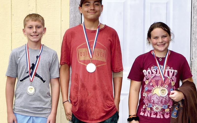 Winners in the West Mineral Eagles fishing derby ages 11-15 bass division were Tate Godfrey, first, 5.03 pounds; Marcell Nash, second, 4.32 pounds and Oakley Hamiltion, 4.03 pounds. Courtesy photo.