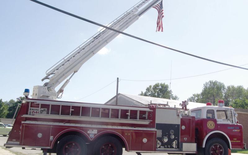 The Hot Rod and Hoses week-end at Scammon featured this West Mineral ladder truck holding the American Flag over the car show. The Saturday event had a big turnout.
