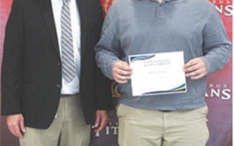 Carter Henry received the Tom Goettel Scholarship during the 2025 Senior Assembly held at the Columbus Unified High School Gymnasium, May 16. CUHS Principal and incoming USD493 Superintendent, Dan Grundy presented the scholarship.