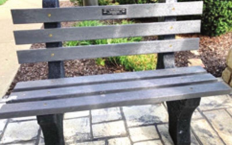 Local Girl Scouts recycle bottle caps to create new bench
