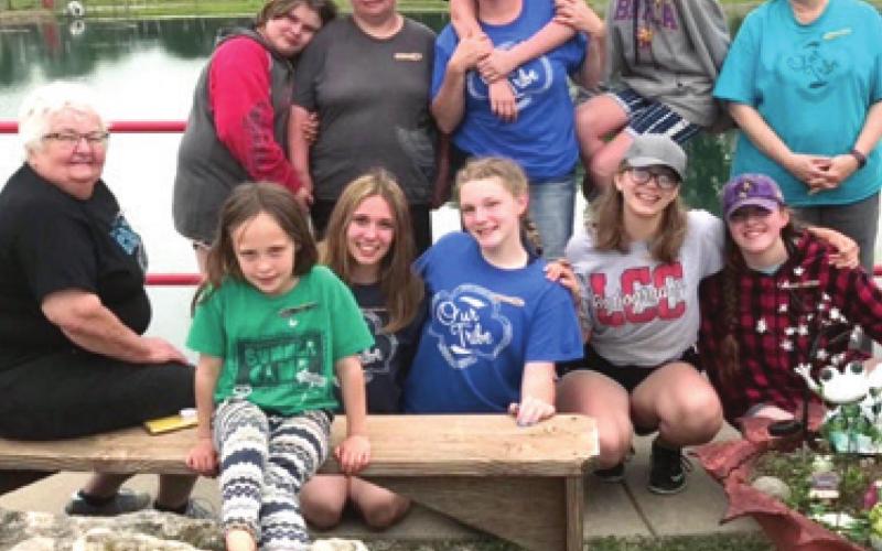 Local Girl Scouts recycle bottle caps to create new bench