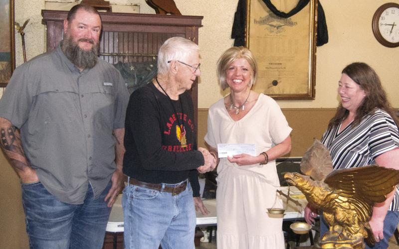Members of the West Mineral Eagles presented Joplin Ronald McDonald House Executive Director Lori Jones with a donation check raised by the Eagles as well as several pounds of aluminum pull tabs. Presenting the check were Jim Wilson, Robert Beal, Director Jones and Crystal Beal. Jones indicated the check made her trip from Joplin worthwhile.