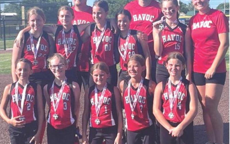 A Columbus Girls Softball Team, the Havoc, took second place in a one-day tournament Saturday in Chanute. The girls played four games and received medals for their runner-up finish in the 12U division. Team members are front row: Olivia Dainty, Reagan Holmes, Gracyn Carter, Lakynn Burton, and Alaina Smiley. Back row: Evelyn Smith, Paizley Buergin, Kinsley Hess, Kayelynn Adoremos, and Brynlee Schalk. Coaches for the team are: Donny Carter, Steven Burton, and Katie Simpson. Courtesy photo.