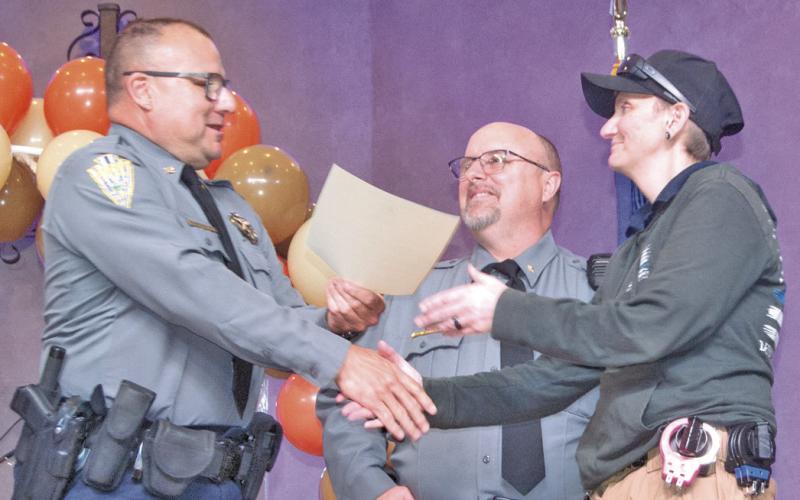 Sheriff Henderson presented Detention Deputy of the Year April McAfee with her award.