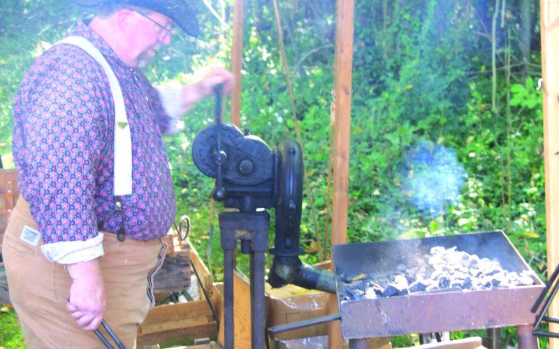 It was not uncommon for blacksmiths to accompany the army into battle as they made parts for guns, knives, swords, and other metal items for soldiers and encampments. During the recent re-enactment in Baxter Springs of Quantrill’s raid on Fort Blair Jim Friend, of Grove, Oklahoma brought his portable blacksmith shop to the battle site.