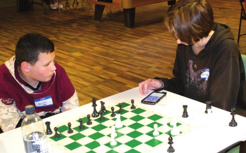Area students match moves in Columbus chess tournament
