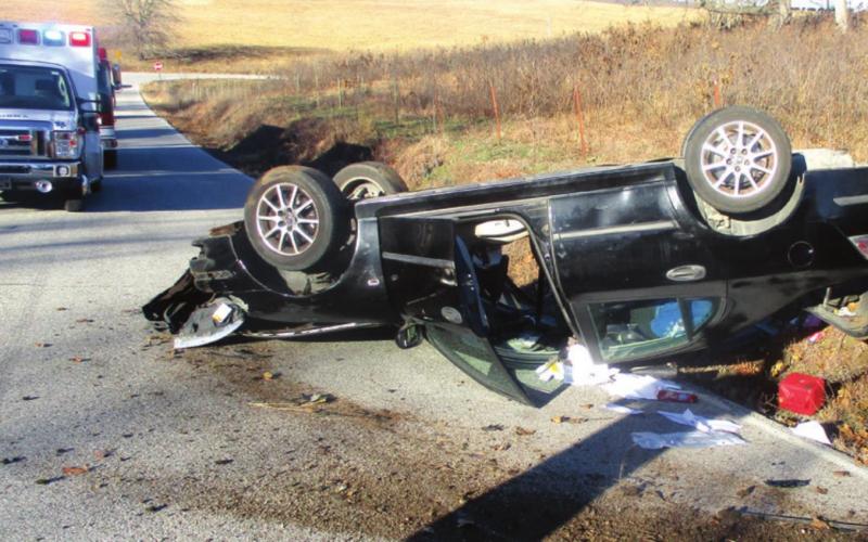 A rollover accident occurred Tuesday morning when Sayer Gooman of Baxter Springs struck two deer, left the roadway and overturned. Authorities report he was transported to a Joplin hospital for non-life threatening injuries. Courtesy photo.