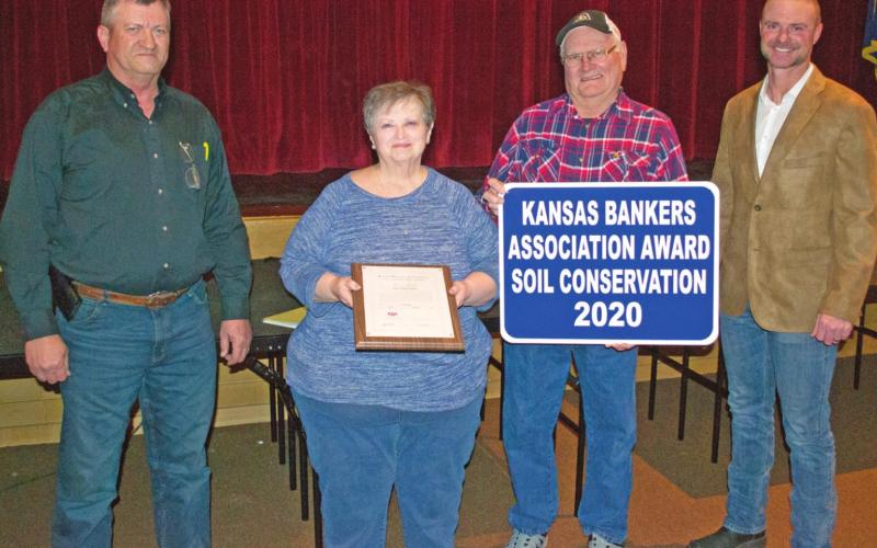 The annual Kansas Bankers Association Conservation award was presented to Pat and Joe Carlson recognizing their efforts to conserve water and soil on their 160 acre family farm. The Carlson’s farm has been in their family for 160 years.