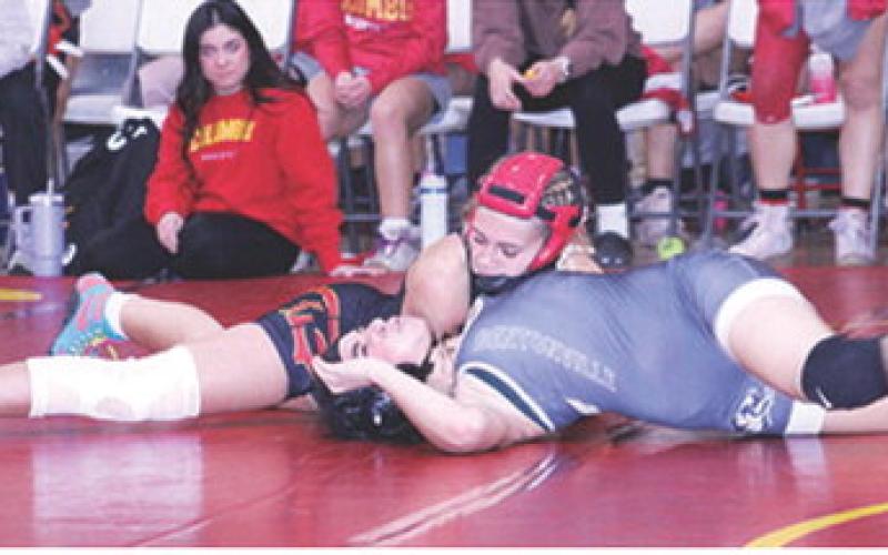 Lady Titan Junior, Tatum Kirk, got the win over her Bentonville, Ark. opponent during a home duals tournament in December. Tatum took first place in the 120-pound weight class at the Sixth Annual Eureka Women’s Invitational Tournament, Friday, in Eureka, extending her 2025-26 season record to 15-4. Lady Titan Assistant Coach, Grace Noel, looks on from mat side.