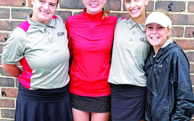 Lady Titan Eighth Graders, Fallon Smiley, Cali Carpino, and Addison Johnson and seventh grader, Tyler Kirk are leading the way for the Columbus Junior High Golf Team this season. Courtesy photo.