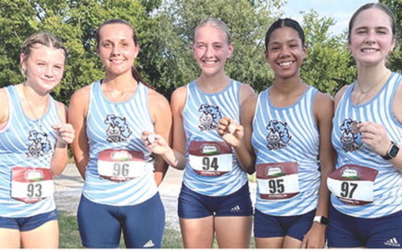Wary, Lady Titans first at Girard Invitational Tourney