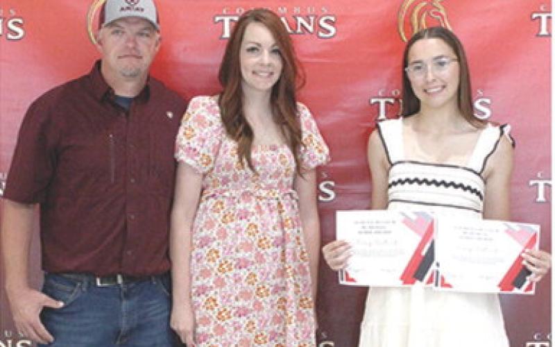 Torey Tedlock received the Athena McColm Memorial and the Charles McColm Memorial Scholarships in the amount of $500 each during the 2025 Senior Assembly at the Columbus Unified High School Gymnasium, May 16. Jake and Jessie Cain presented the awards.