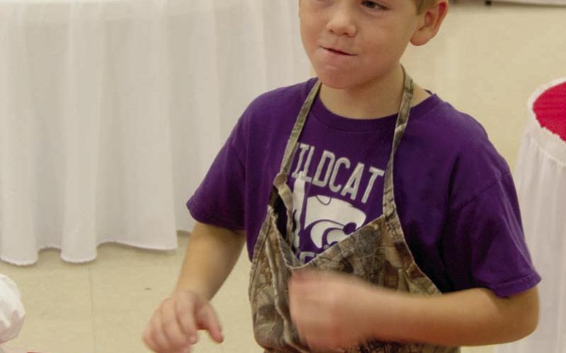 Colton Holden was checking the candy samples at the St. Bridget’s Cookie Walk on Saturday. A large early crowd took away pounds and pounds of cookies and candy made by the members of the Altar Society.