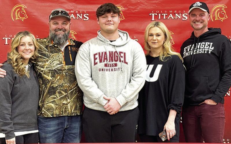 Titan Senior, Carter Henry, has signed a National Letter of Intent to continue his football career at the college level with Evangel University. Carter was joined by his parents Elizabeth and Chad Henry and Andrea and Jim Gaither and his family during a signing day held at the CUHS Gym, Friday.
