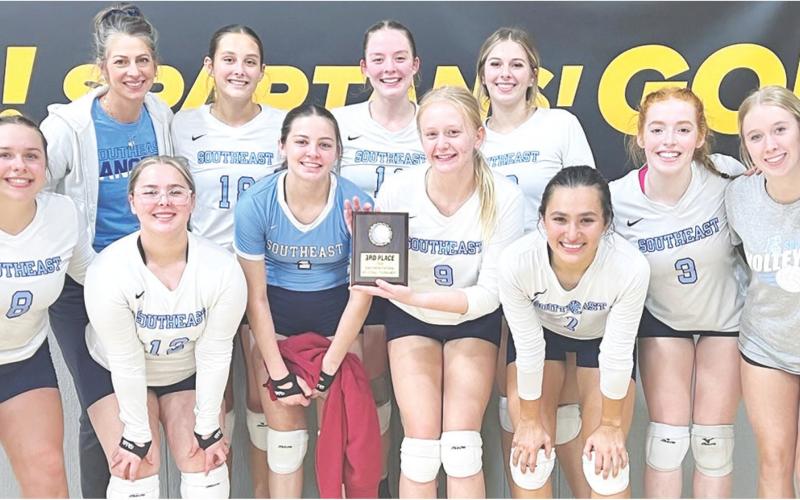 The Southeast Lady Lancer Volleyball Team placed third in the Dexter, Mo. Tournament, Saturday. The team had many games to hone their skills and improved to a 6-7 record. Team me_ sophomore, Camryn Sanders_ sophomore, Sienna Collins, junior, Maizy Williams, and Head Coach Maya s* — ■ . _ . . White. Courtesy photo.