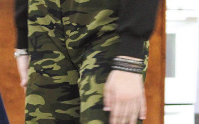 Sophie Elmore displayed her camo themed outfit at the annual 4-H Style Revue Saturday, June 27 at the Extension office in Columbus.