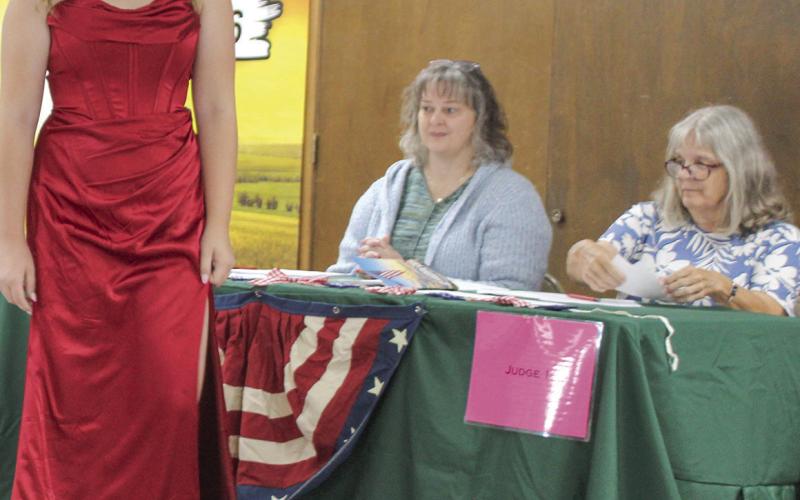 At the annual 4-H Style Revue held Saturday, June 27 at the Extension office in Columbus, Addison Queen showed her formal wear to the judges.