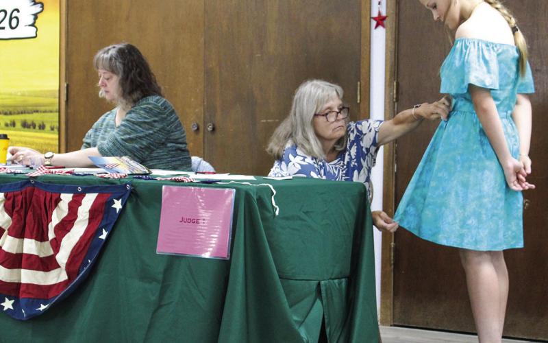 Allison Brown was being critiqued by the judges during her turn during the annual 4-H Style Revue.