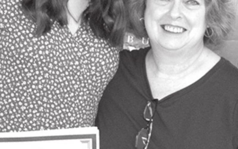 Karen Langerot, CUHS Instructor, presented Avery with the TNT Scholarship.