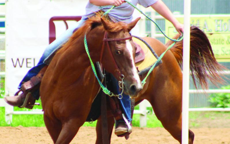 Airauna Sharp was competing in Pole Bending during the Cherokee County Horse Show Saturday, July 12.