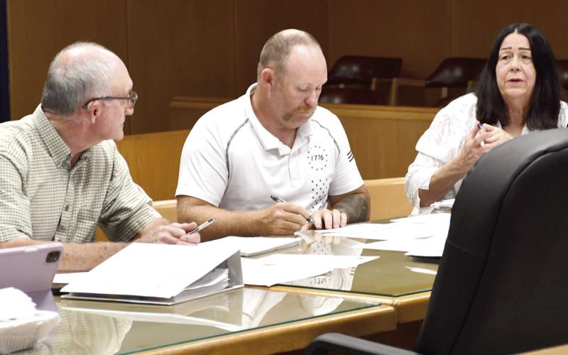 Residents flooded the district courtroom Monday morning in attendance of what was originally planned as a public hearing on exceeding the revenue neutral rate. Cherokee County Commissioners Jack Garner, Cory Moates and Myra Frazier (above) engaged with an audience of more than 100 residents (below), hearing concerns on a potential budget increase for 2027.