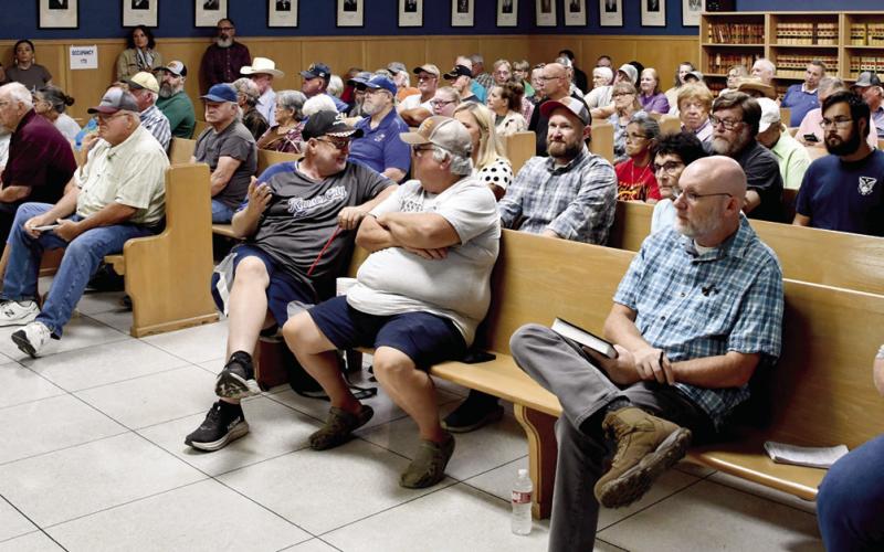 Residents flooded the district courtroom Monday morning in attendance of what was originally planned as a public hearing on exceeding the revenue neutral rate. Cherokee County Commissioners Jack Garner, Cory Moates and Myra Frazier (above) engaged with an audience of more than 100 residents (below), hearing concerns on a potential budget increase for 2027.