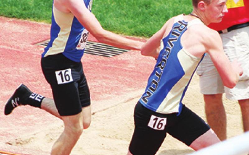 Members of the 4x800 Meter Relay Team, above: Jaxon Gantt to Dillon Leggett and below: Tyler Haywood to Michael Sheperd, exchange the baton at the KSHSAA State Class 3A Track and Field Meet, Friday in Wichita. The Ram Team placed 16th with a time of 9:11.4 minutes. Photos by Dee Riley.