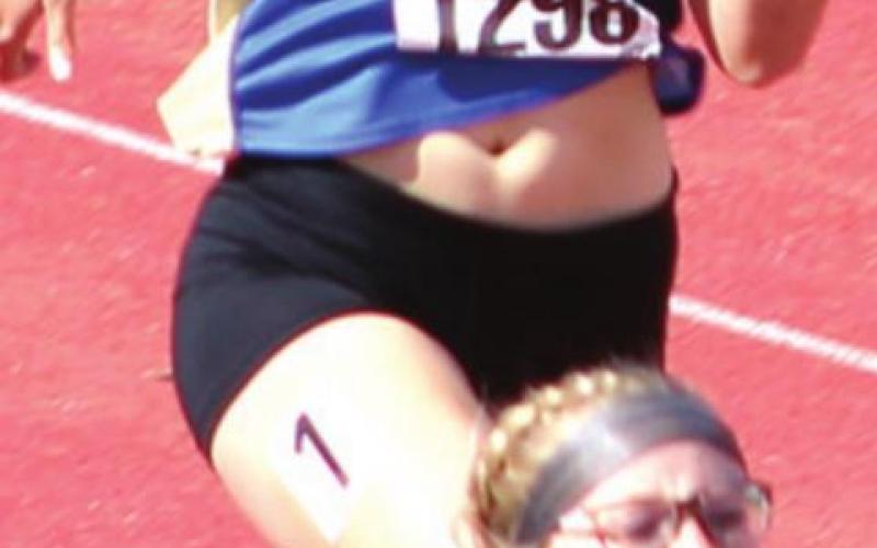 Sophomore, Jacy Thomasson finished seventh in the 200 Meter Dash at the Kansas State High School Track and Field Class 3A Meet, Friday in Wichita. Photo by Dee Riley.