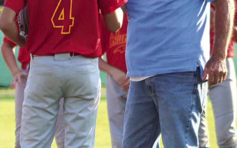 Commissioner tosses first pitch