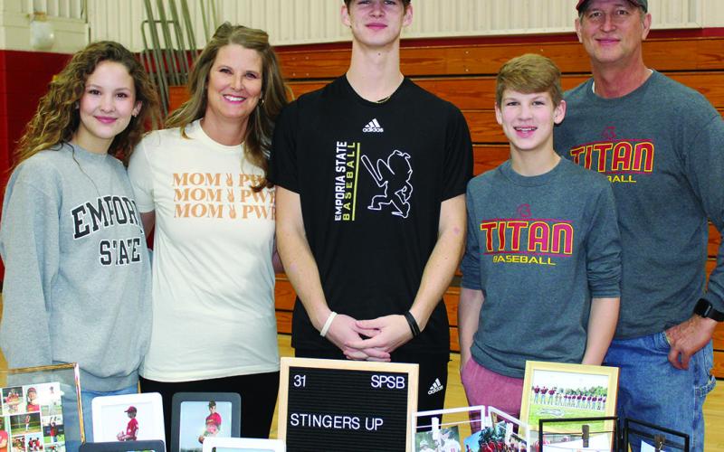 Titan Senior, Seth Stover, signed a National Letter of Intent to continue his baseball career at Emporia State University. Seven Columbus athletes signed letters during a ceremony at the CUHS Gymnasium, Monday, in recognition of National Signing Day, the first Wednesday of February. Seth’s signing was witnessed by his siblings, Ruby and Jonas Stover, and his parents, Holly Stover and Craig Stover.