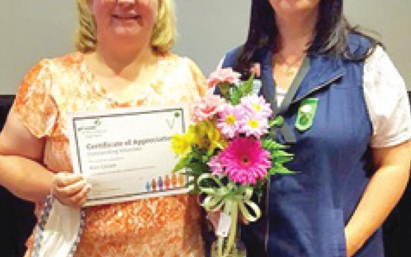 Kim Linam was awarded Outstanding Volunteer award at a recent leaders’ appreciation dinner. Cassy Spoonemore was awarded the Leadership Launch award at a ceremony held by the Girl Scouts of Missouri Heartland council in Springfield, Mo. Courtesy photo.
