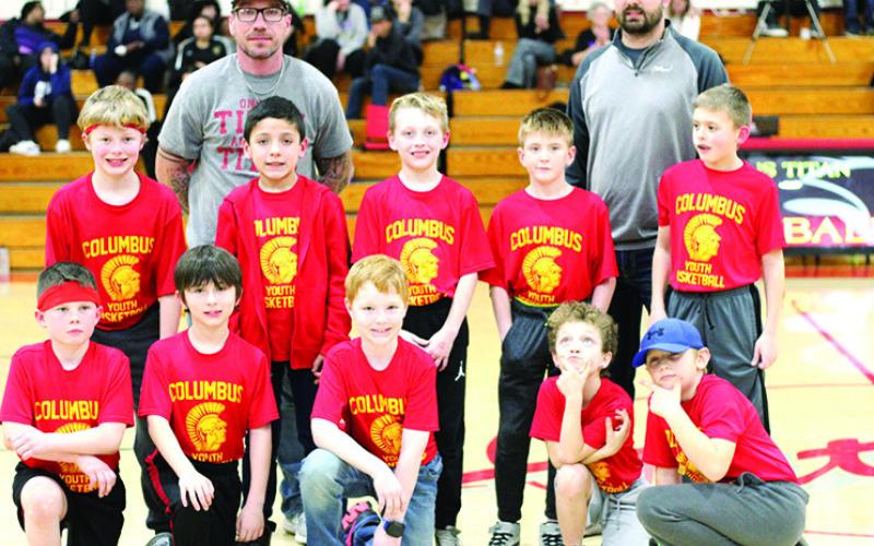 The Columbus Recreation Fourth Grade Boys Basketball Team was introduced during the halftime of the Titan Varsity Boys game against Coffeyville at the CUHS Gymnasium in February. Team members are front row: Mason Worden, Hunter Davis, Beckett Sauerwein, Tucker Siemer, and Cruz Sharp. Back row: Eamon Wilkins, Lucas Haviland, Bode Saiz, Braxton Hayes, and Jaxon Harper. The team is coached by Matt Haviland and Hazen Hale.