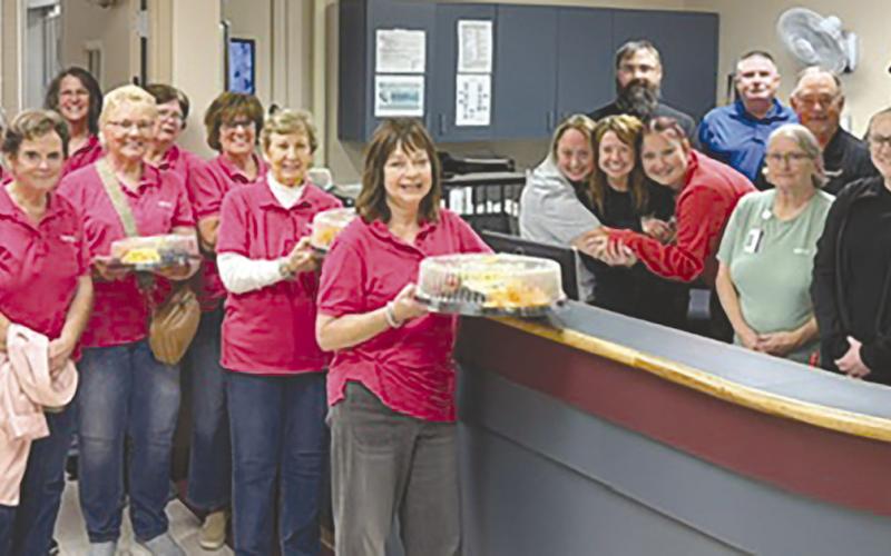 After the May 19 meeting of the Columbus Mercy Auxiliary, members presented the staft at the hospital with fruit trays made by Auxiliary member Bobbi Martin. The trays were in appreciation of the staff and all they do for the community. Courtesy photo.