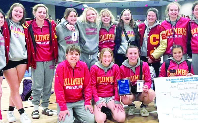 The Columbus Lady Titan Wrestling Team placed second at the Third Annual Topeka-Washburn Rural Women’s Invitational, Saturday. Front row: Mackenzie Richards, Addison Saporito, Katie Simpson, and Brooklyn Lima. Back row: Grace Noel, Taryn Billings, Madelyn Garcia, Brooklyn Collingsworth, Emily Britt, Graci Major, Torey Tedlock, Jailyn Rodriguez, Kassidy Fox, and Aubree Saporito. Courtesy Photo.