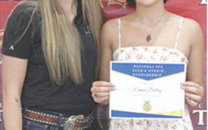 Emma Duling received a National FFA Beck’s Hybrids Scholarship in the amount of $2,000 from representative Cailynn Fedorkowicz during the May 16 Senior Assembly at the CUHS Gymnasium.