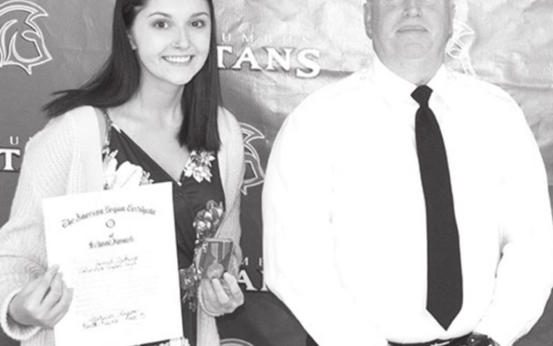 Hannah Andrews received the American Legion Award and Scholarship in the amount of $150 from Jeff Bennett at the Senior Awards Assembly in the CUHS Gymnasium, May 14.