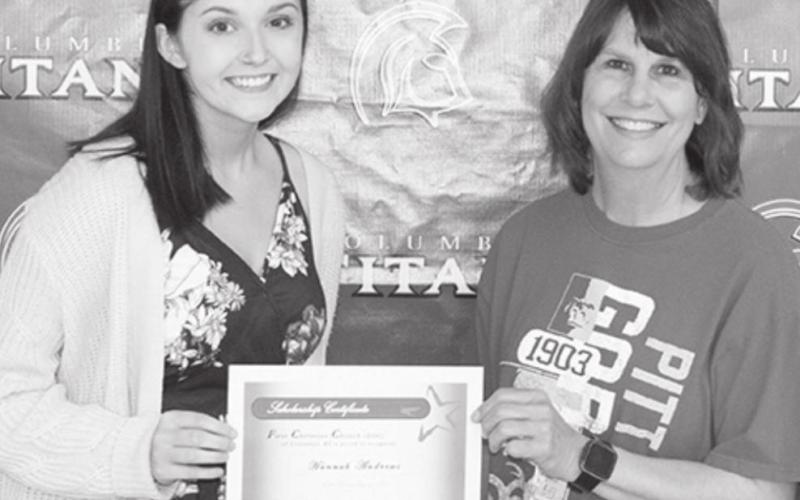 Hannah Andrews received the First Christian Church Albert Fast Memorial Scholarship in the amount of $500 from Susan Schultz at the Senior Awards Assembly in the CUHS Gymnasium, May 14.